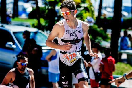 Male athlete, aware of the difference between complete and incomplete proteins, is competing in a marathon race