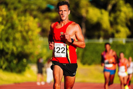 Toned athlete powered by the best collagen for joints is competing in a track race