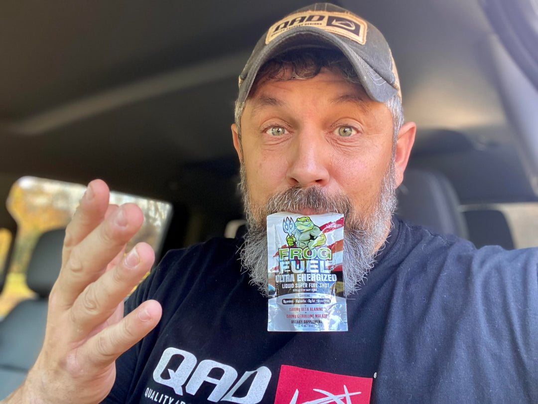 Rugged hunter is holding a packet of Frog Fuel liquid collagen, which helps prevent knee pain from walking too much, in his mouth