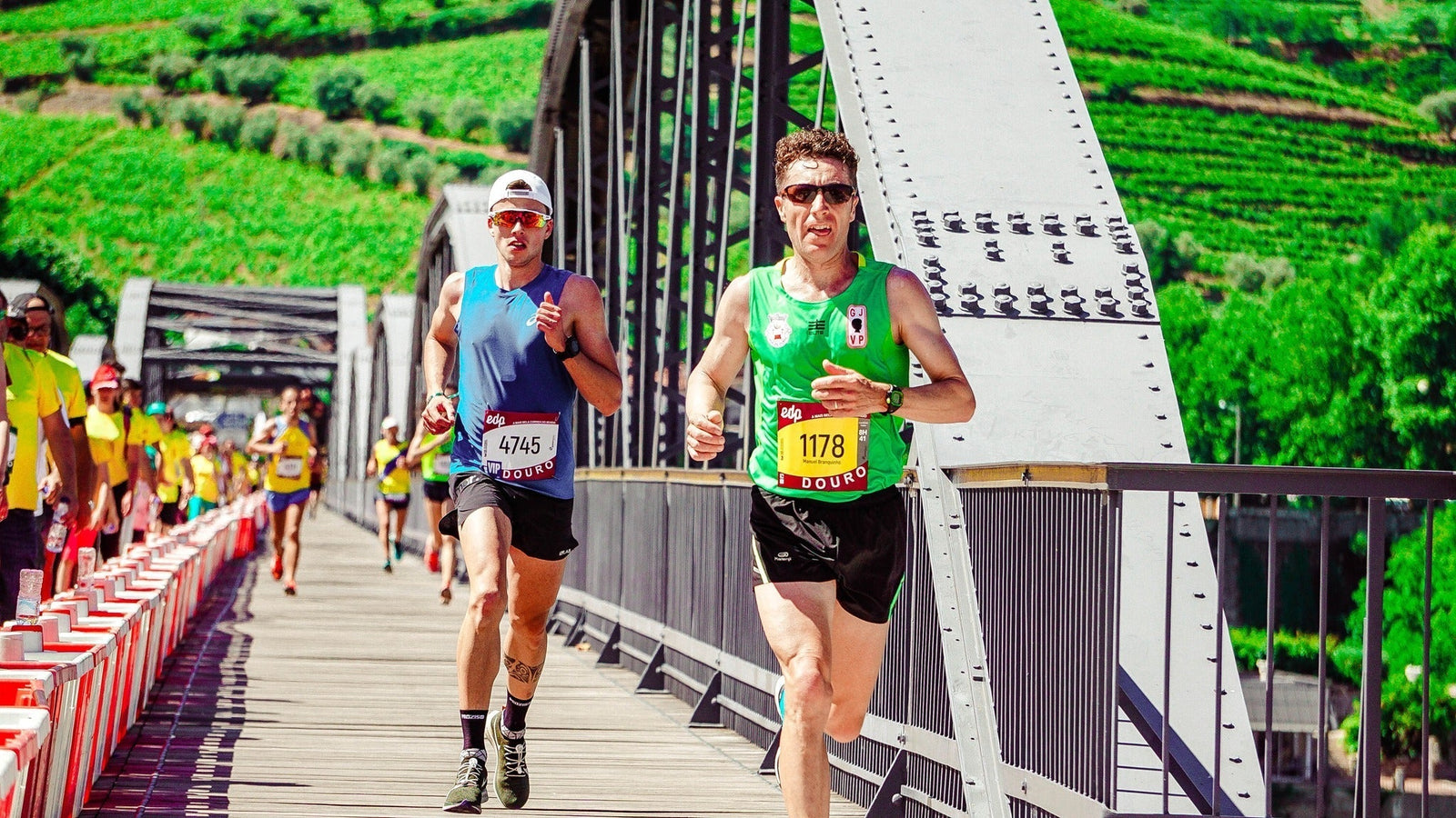 Fit male runner is leading a marathon race as a result of including what to eat the day before a marathon into his diet plan